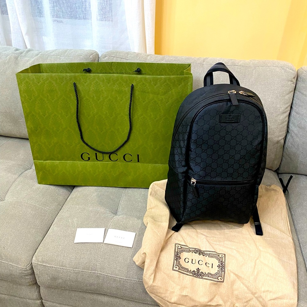 Brand new men backpack! Very spacious! Come with box and dust bag!
